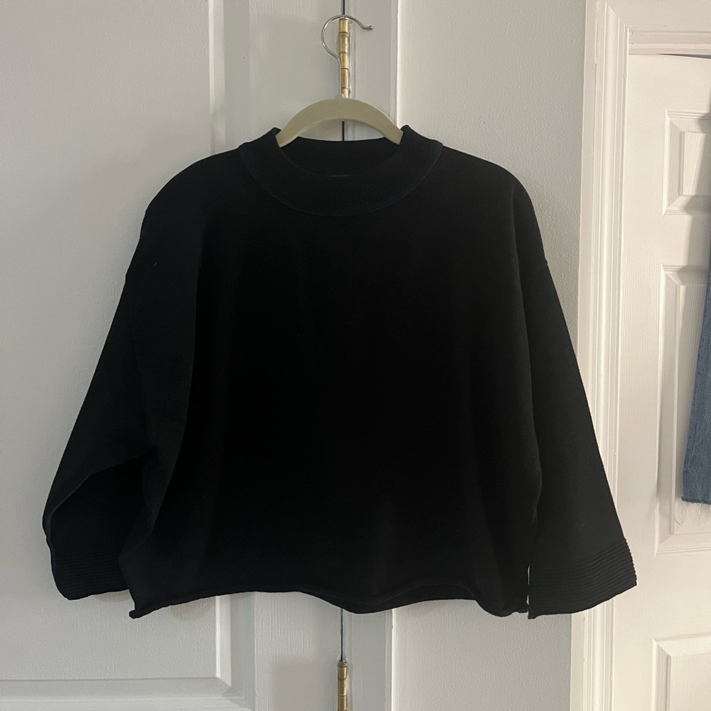 Black mock neck sweater